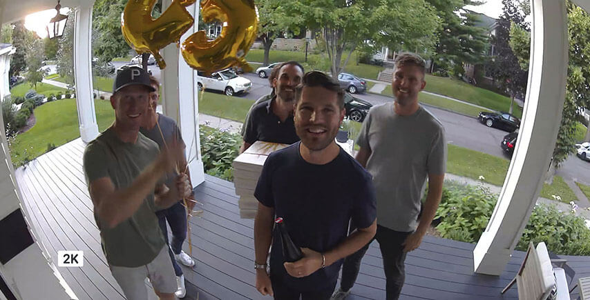 Smart phone displaying 2K HDR video displaying moving objects during the day