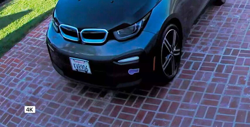 Smart phone displaying 180&deg; viewing angle and HDR video quality, showing someone at door from head to toe